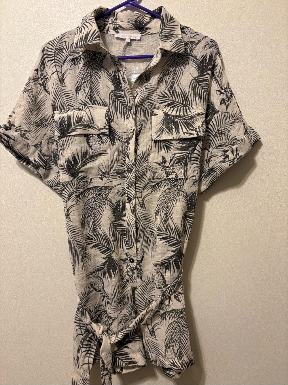 Women’s romper with tropical pattern. Size M